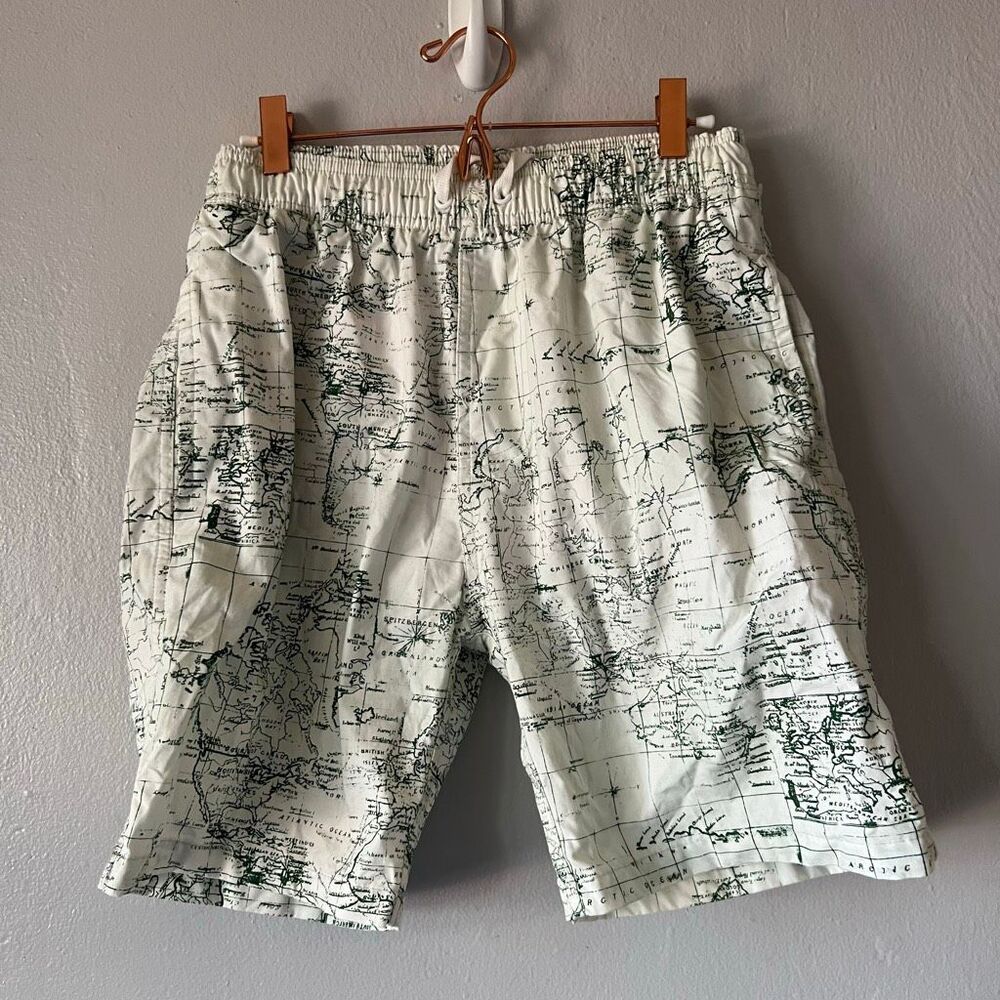 Surfing swim trunks map graphic shorts